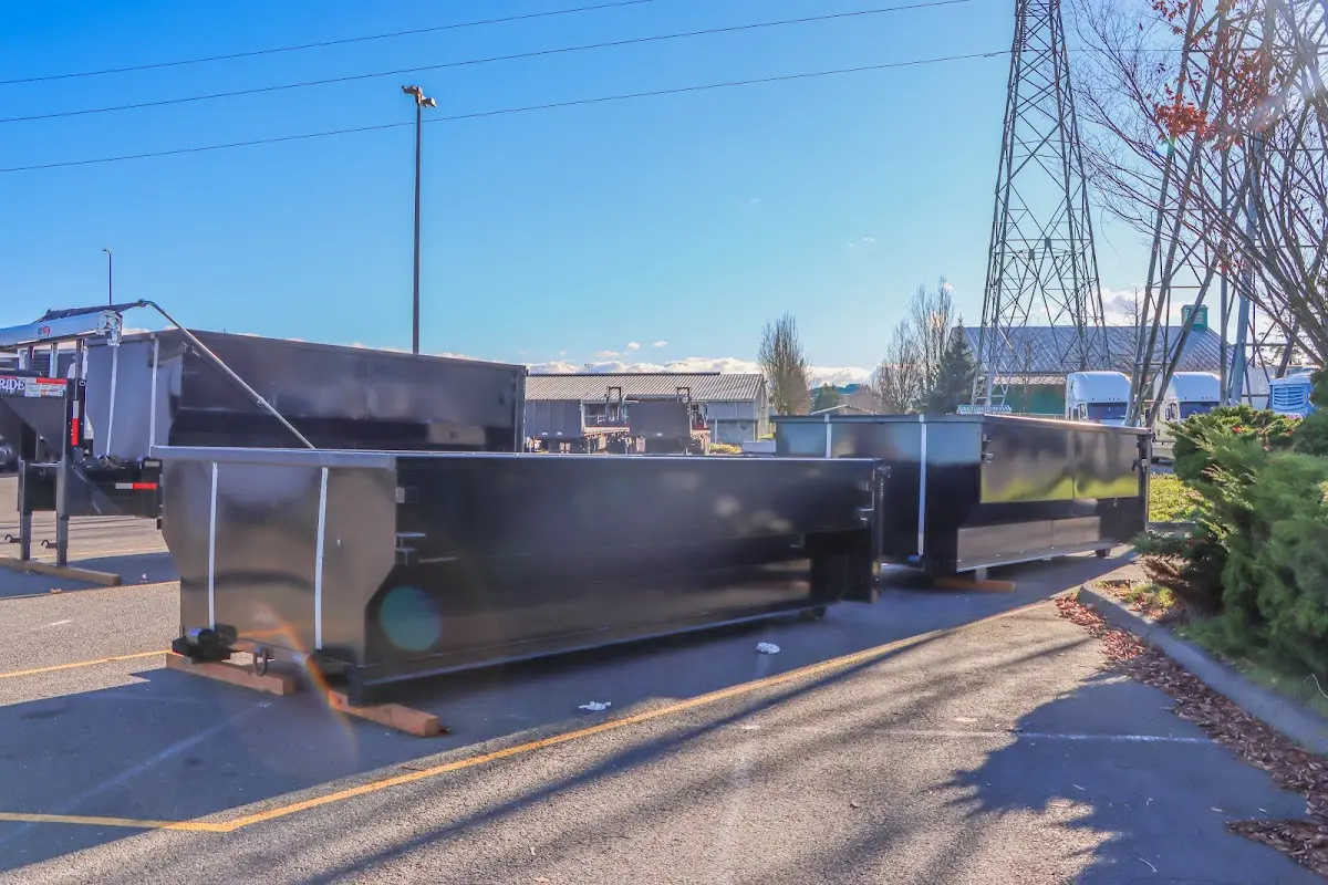 Roll-off dumpster ready for waste disposal at job site for 10 Yard Dumpster Rental in Amory